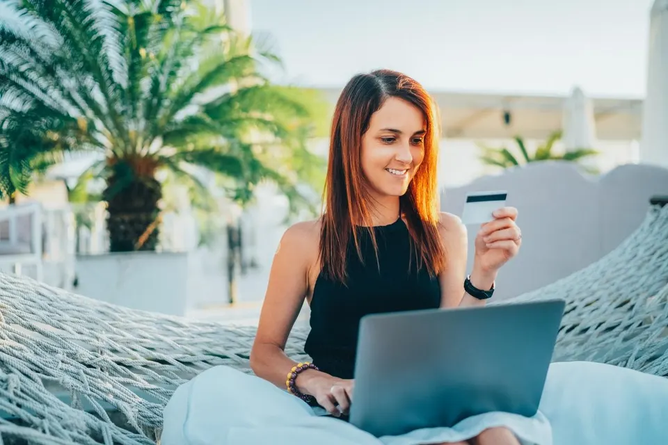 Woman making a purchase online through a small e-commerce business