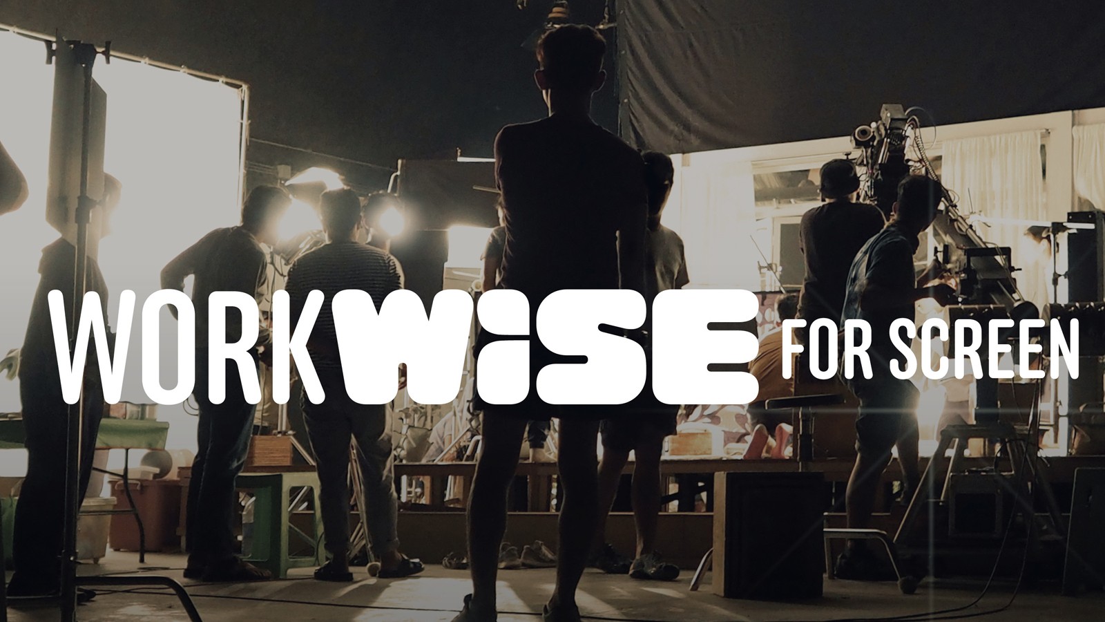 Photography of people working in a film studio, with the text 'Workwise for Screen'