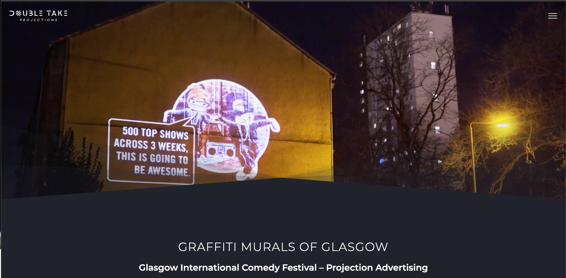 Animated graffiti projected on a building promoting a comedy festival in Glasgow.