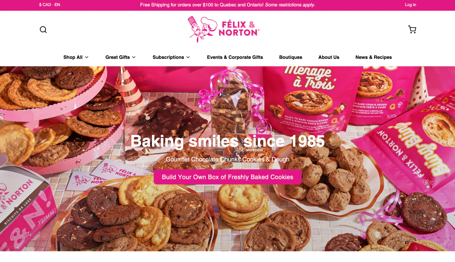 Félix & Norton homepage with a pink-themed display of cookies and ’Baking smiles since 1985.’
