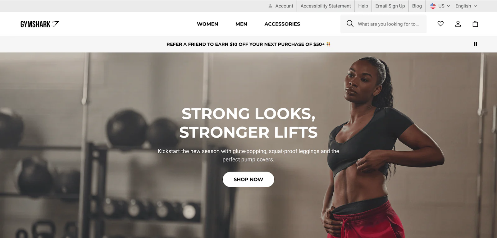 Gymshark website with horizontal header showing woman in workout clothes in gym setting.