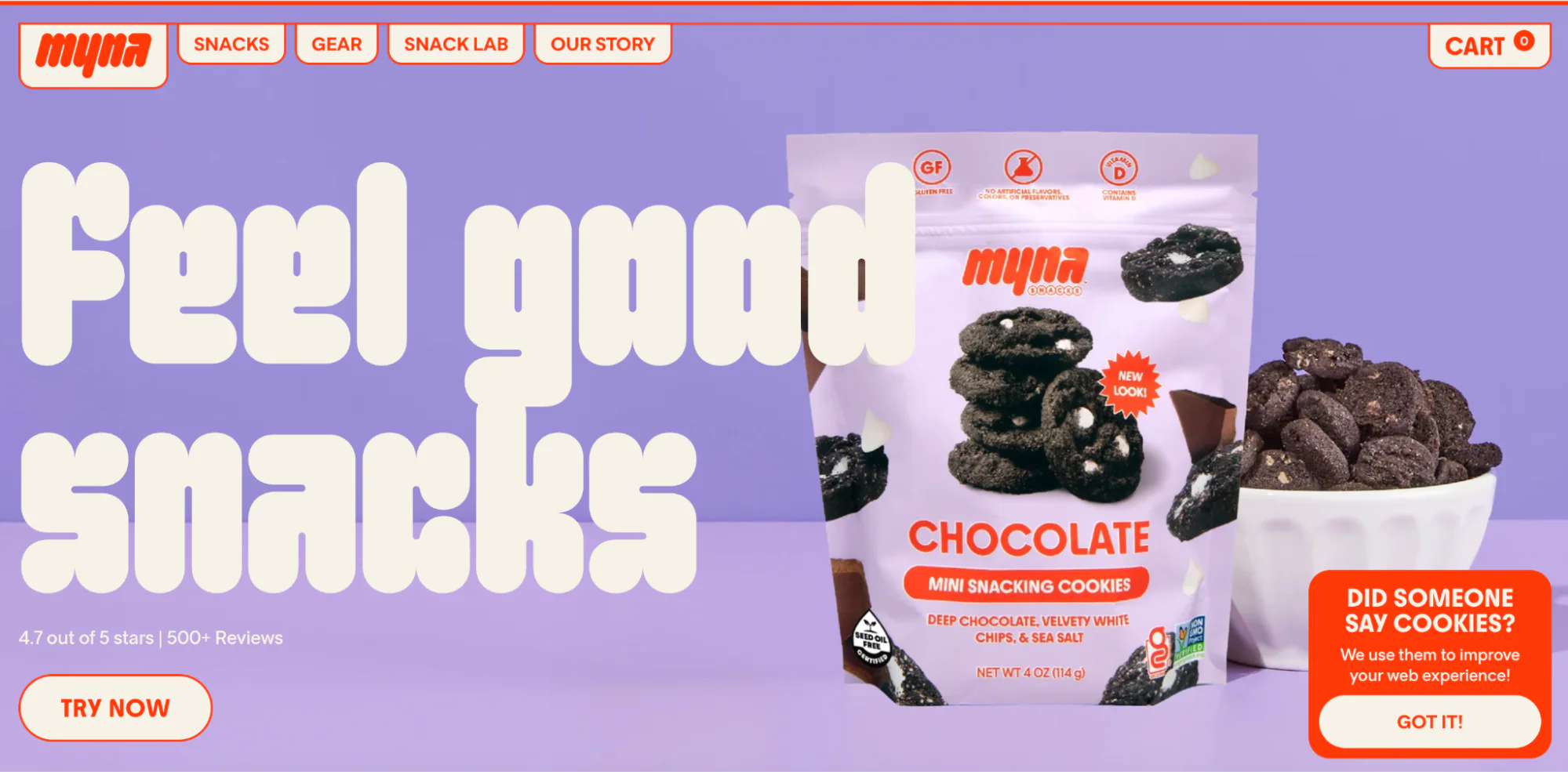 Myna Snacks’ website is purple and red featuring a packet of cookies.