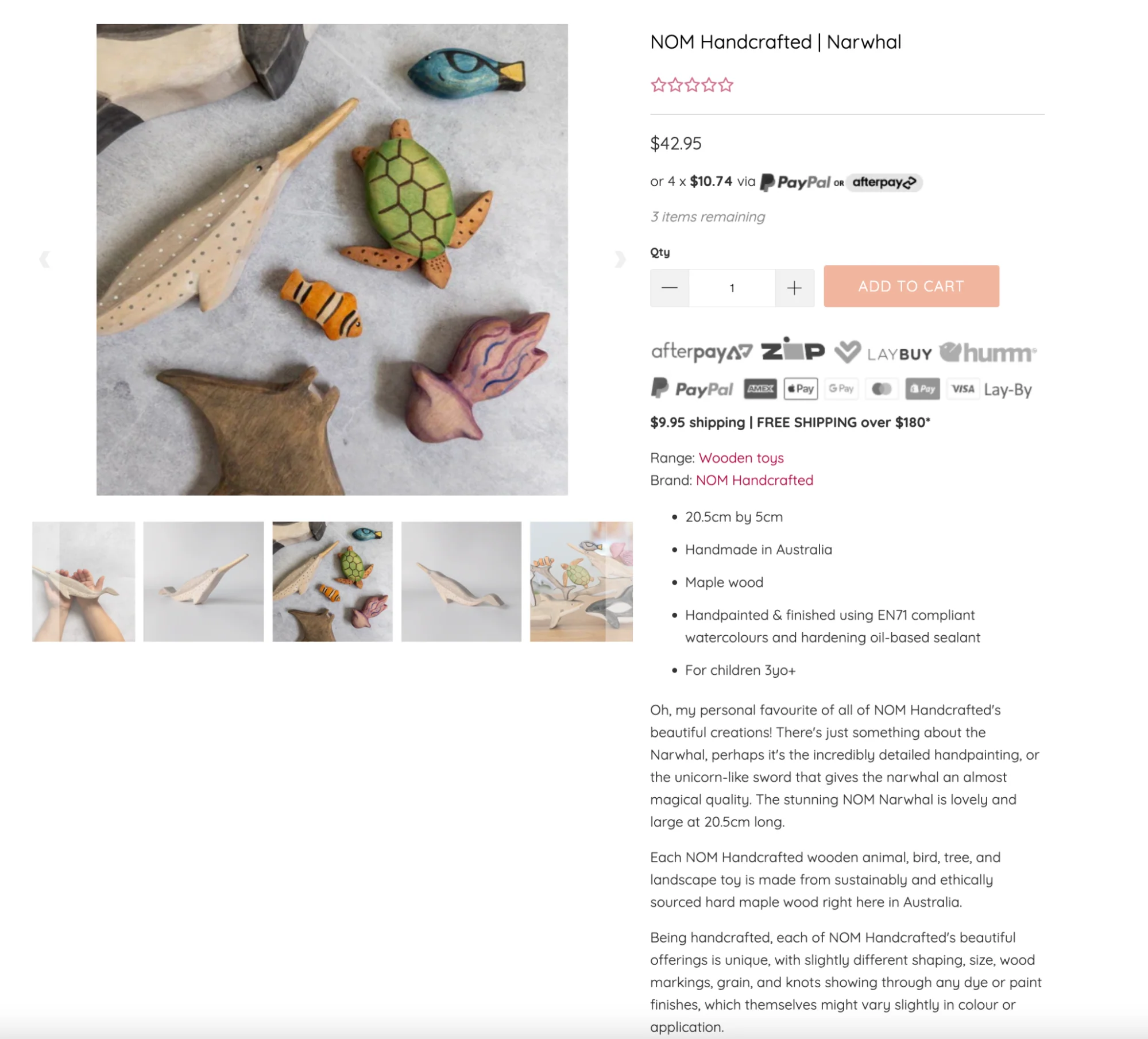Product page for handcrafted wooden narwhal toy with sea creature figures on display.