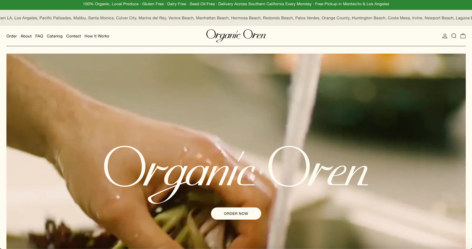 Organic Oren homepage featuring a hand washing lettuce and an order now button.