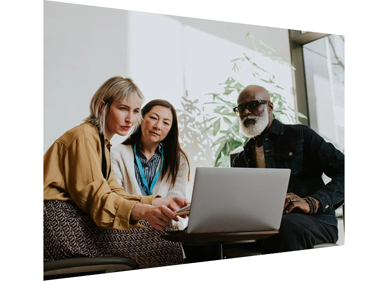 Three people coworking in modern office