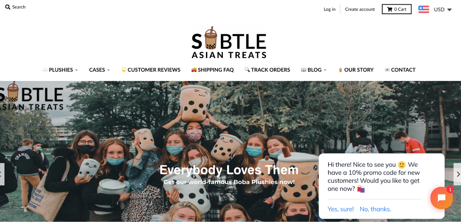 Subtle Asian Treats homepage featuring a group holding boba plushies.
