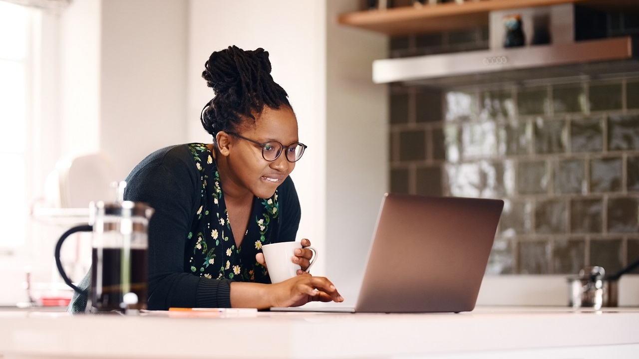 Woman researching on a computer