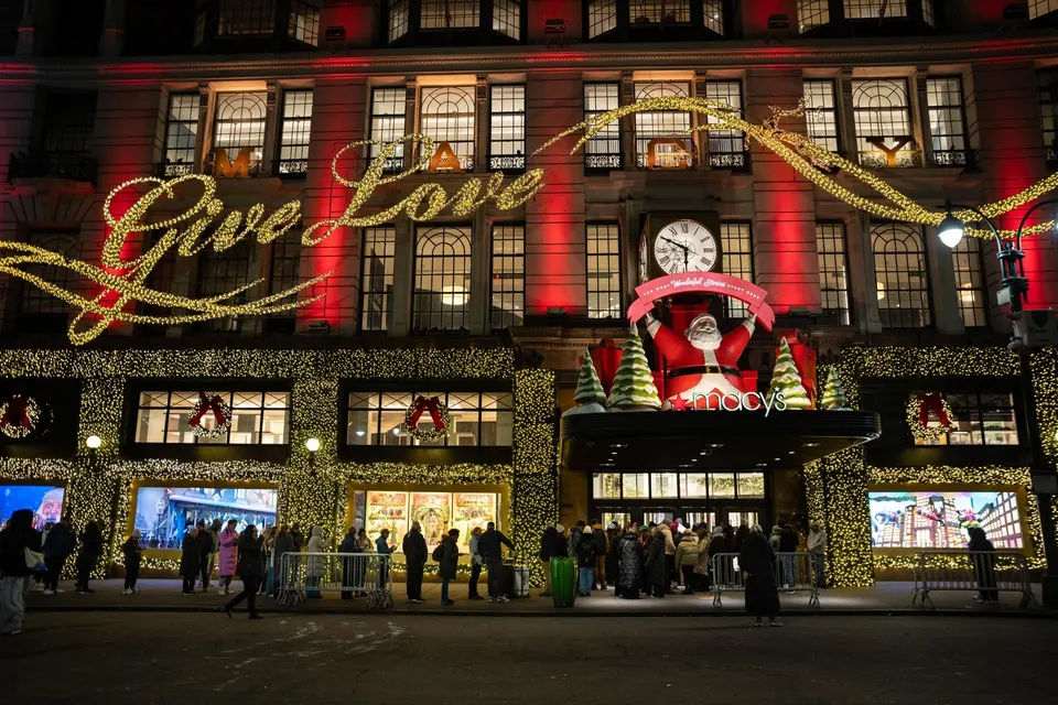 Black Friday Shoppers waiting in line to enter Macy's flagship store in New York on Friday,. (AP Photo/Angelina Katsanis)