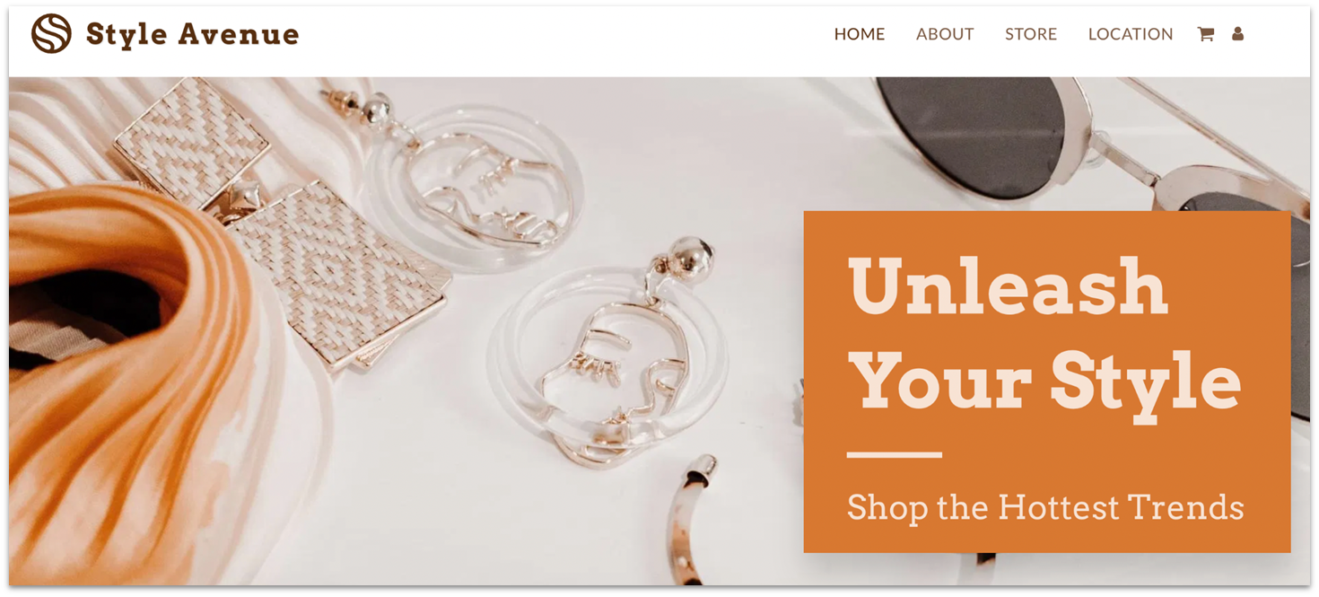 SITE123's jewelry online store template, showing earrings and a glass frame.