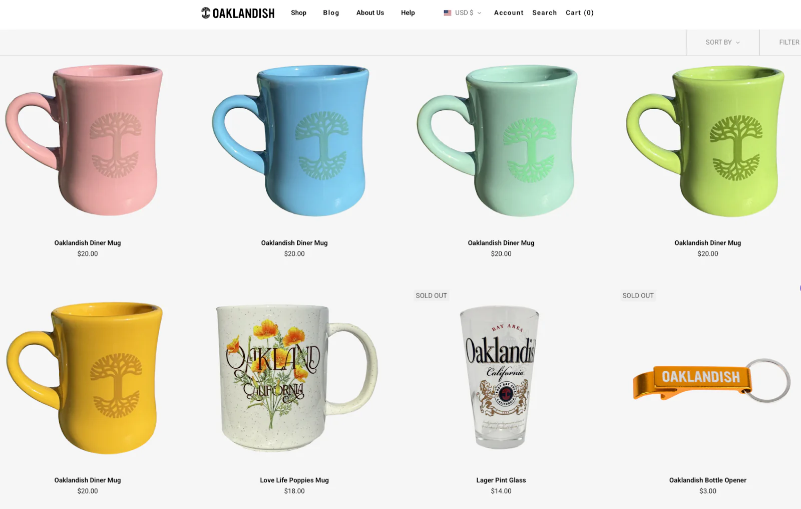 Colorful coffee cups, barware, and a bottle opener from Oaklandish.