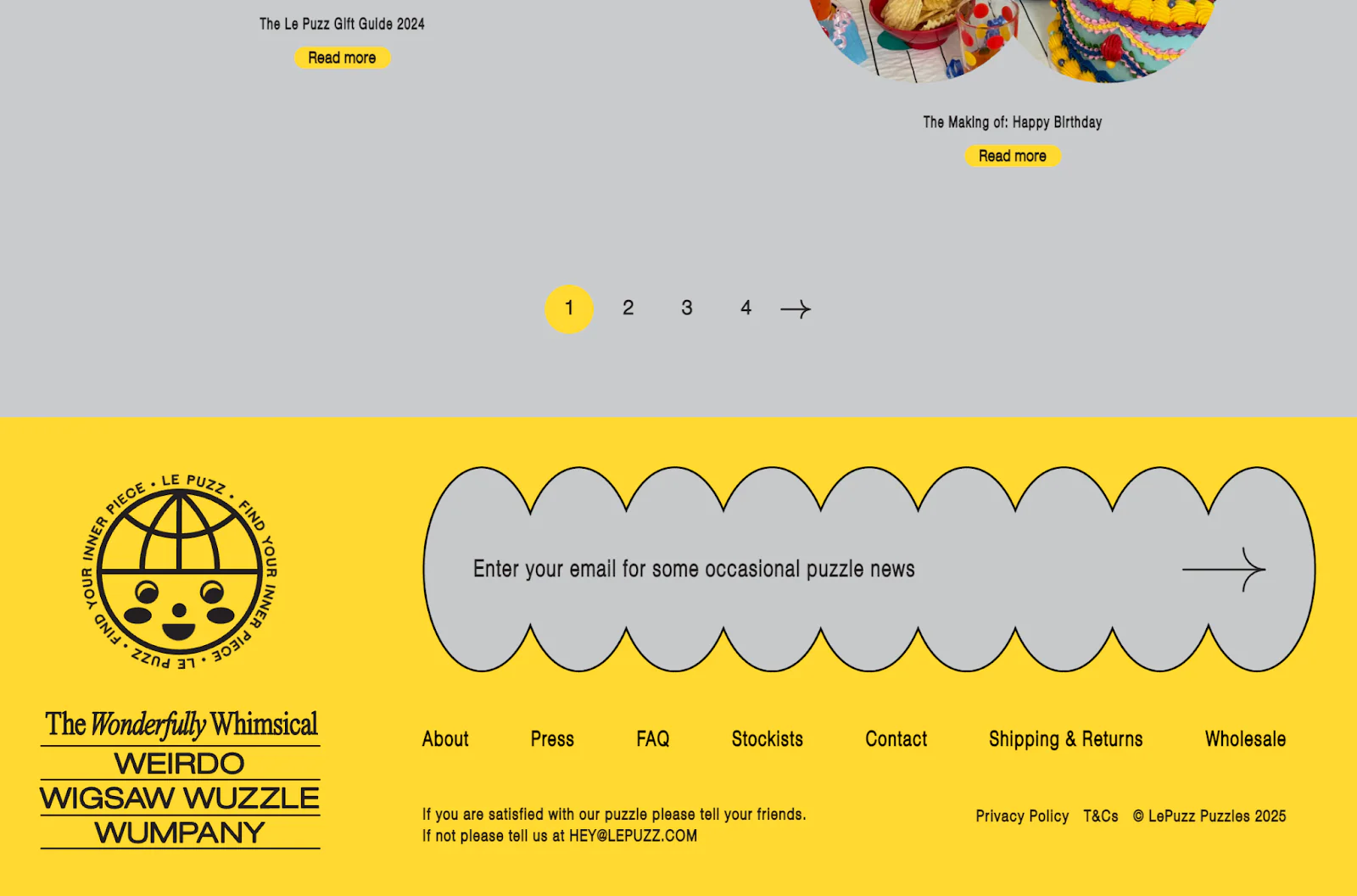 Yellow Le Puzz blog footer with long grey bubbly shaped newsletter capture field.