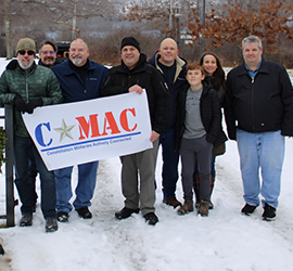 Placeholder image of a red neon sign that reads, 'Taquero Mucho' on a brick wall.