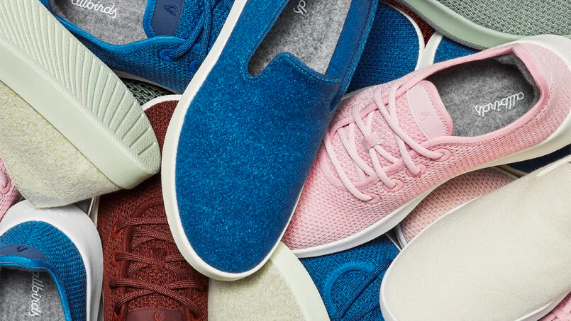 Image of Allbirds shoes in blue, pink, cream, and dark red