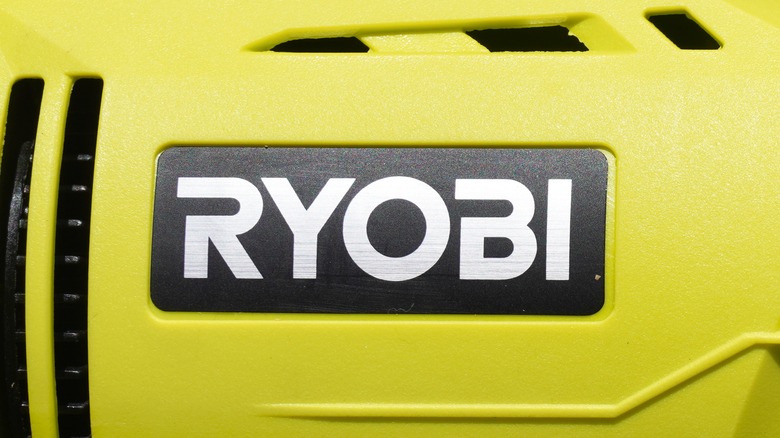 The Ryobi logo on a power tool.