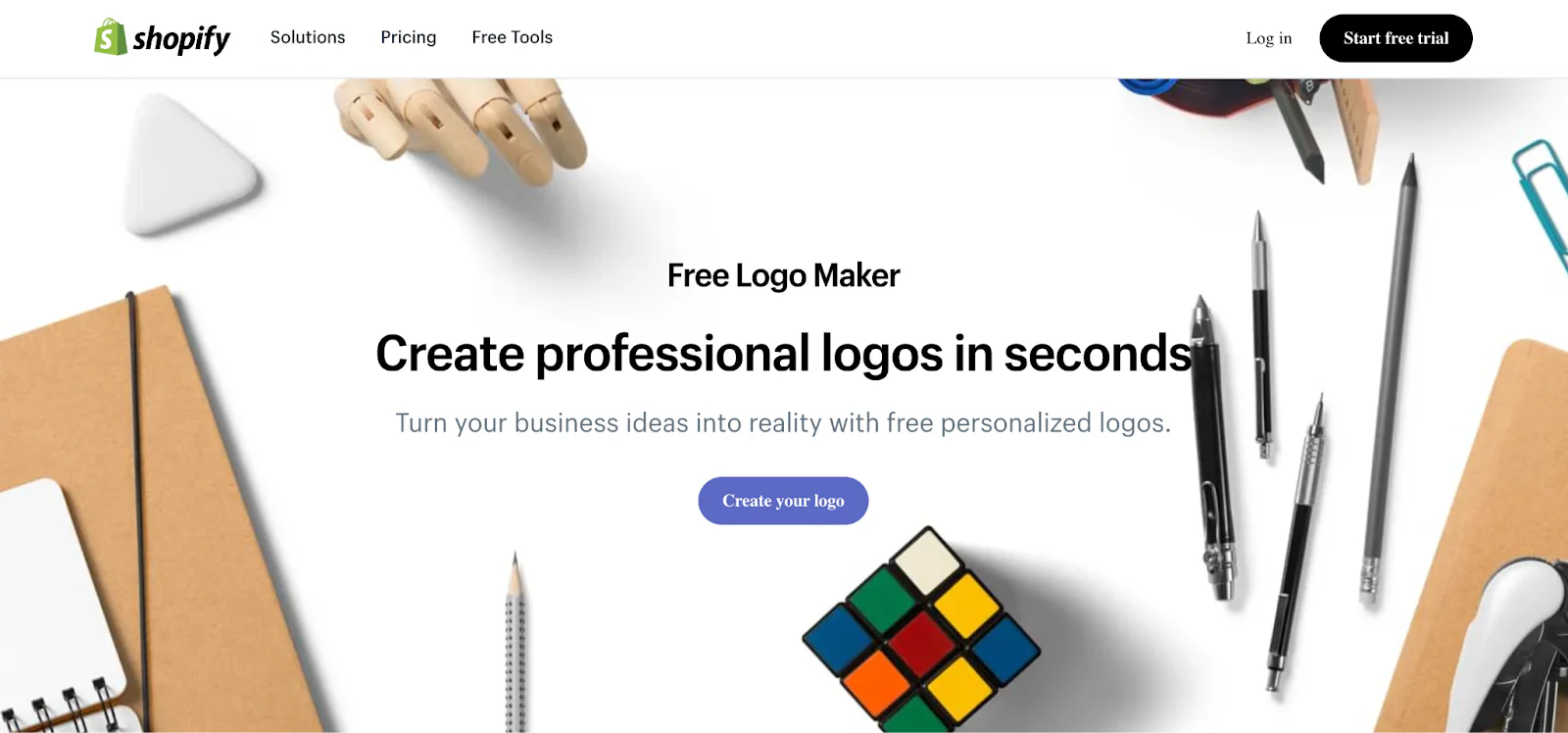 Shopify’s Free Logo Maker homepage with creative tools illustration.