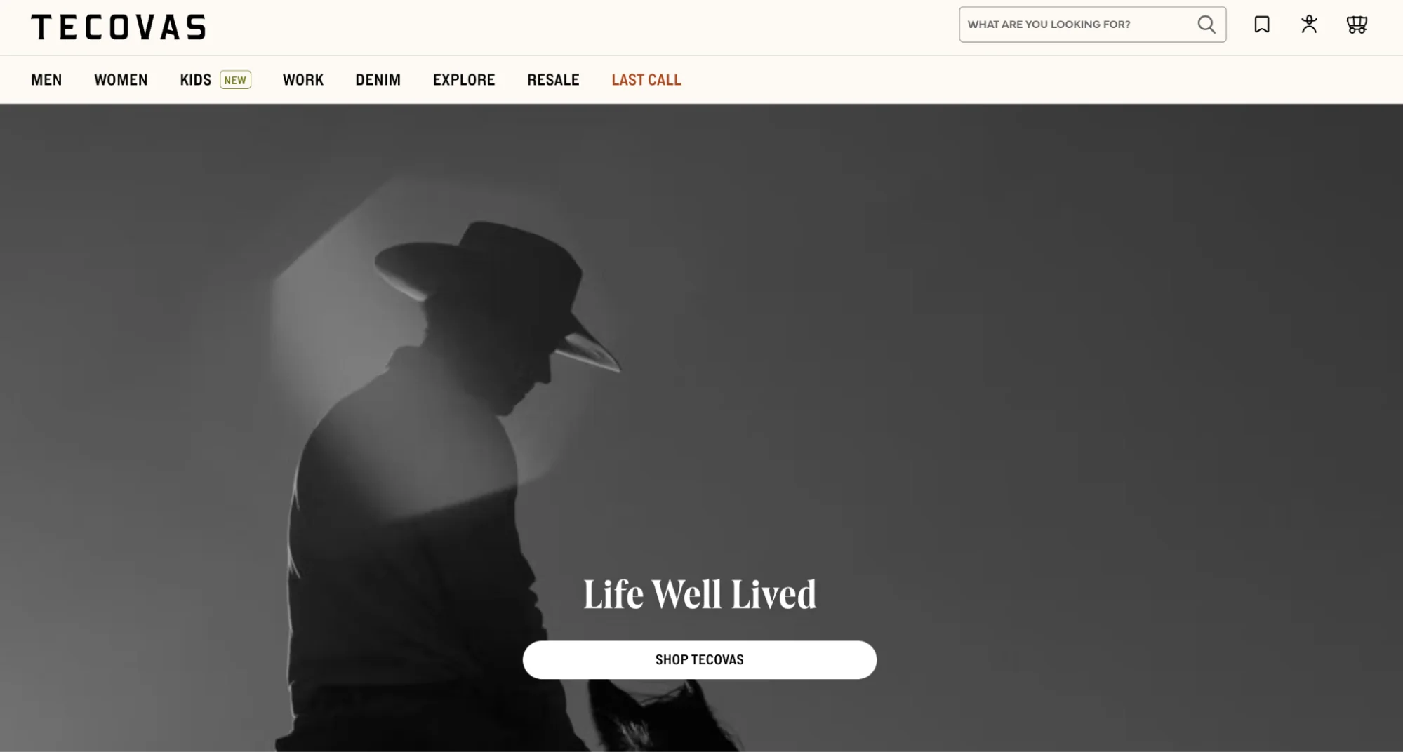 A moody silhouette of a man in a cowboy hat with his dog for the Life Well Lived campaign.