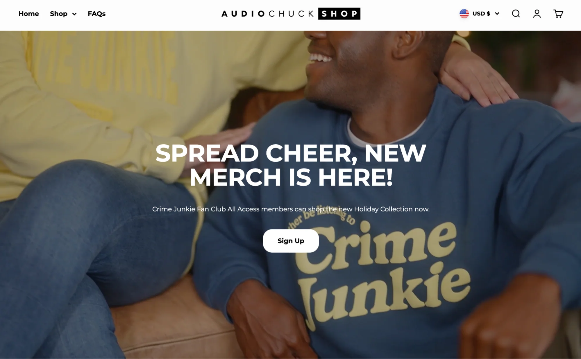 The Audiochuck Shop website homepage announcing new Crime Junkie holiday merchandise.