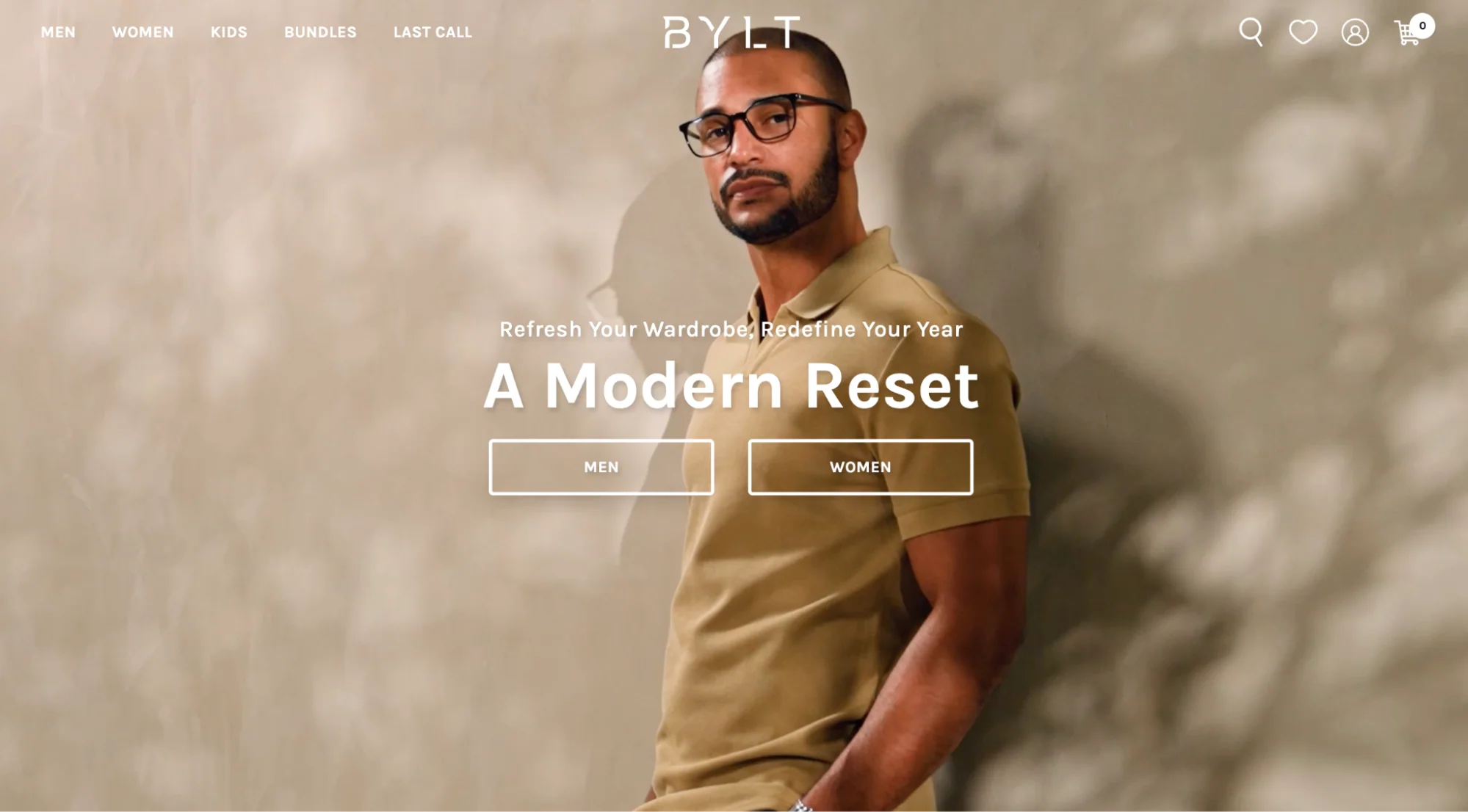 Man in glasses and tan polo for the BYLT A Modern Reset wardrobe refresh campaign.